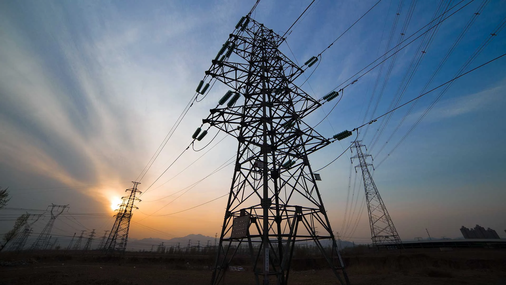 Electricity transmission at sunset